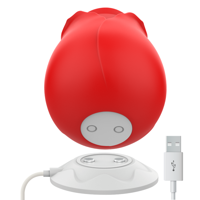 Stimulateur rose rouge vu en plongee avec ses contacts de charge et cable USB, detail du dessous du sextoy clitoridien par aspiration en silicone body-safe rechargeable.