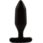 Plug anal Onyx noir en silicone présenté debout, corps facetté à pointe nette et large base évasée, finition mate inspirée de la pierre, vue verticale du produit sur fond blanc.