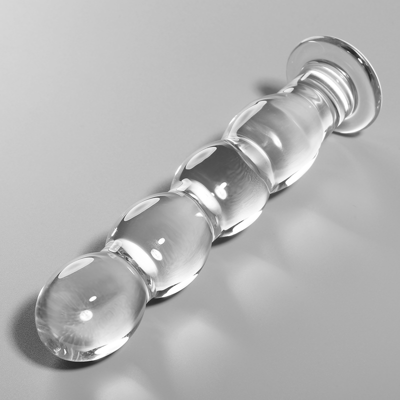 Gode chapelet en verre borosilicate transparent Nebula Series couche sur fond gris, succession de billes lisses et base large, matiere non poreuse facile a nettoyer.