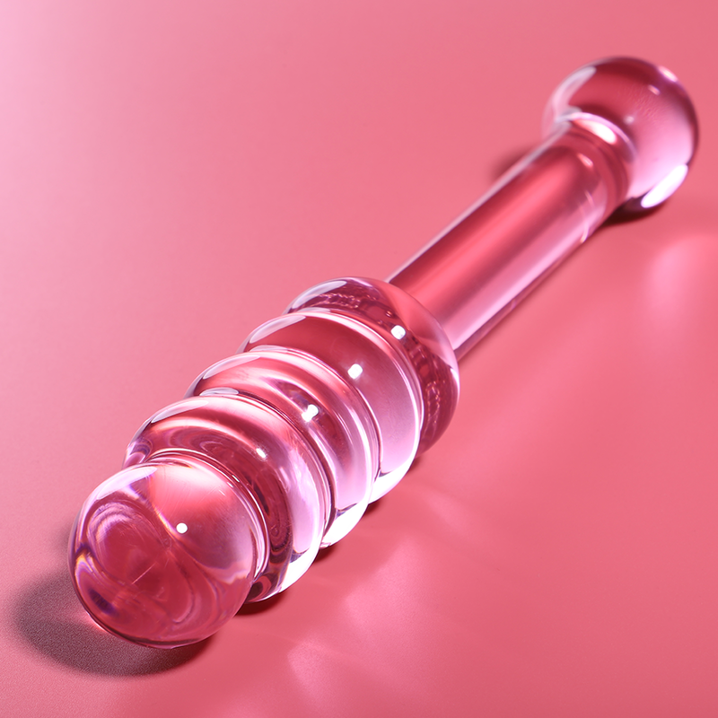Gode en verre borosilicate rose couche sur fond corail, renflements anneles lisses et embout spherique brillant, sextoy non poreux a jeu de temperature.