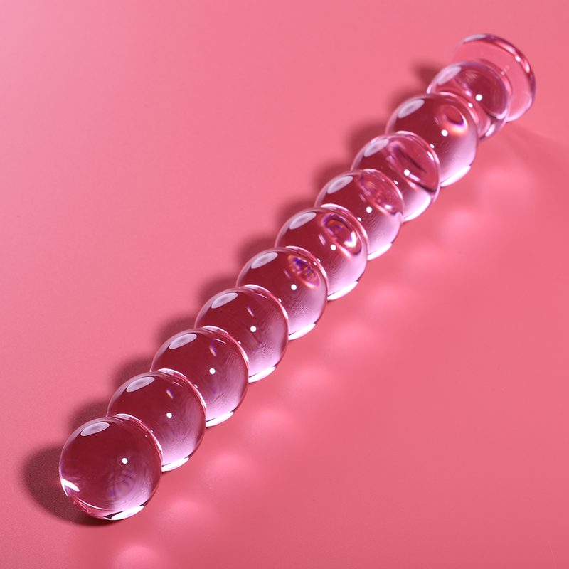 Chapelet anal en verre borosilicate rose couche sur fond corail, billes lisses graduees brillantes et embout arrondi, sextoy non poreux a jeu de temperature.