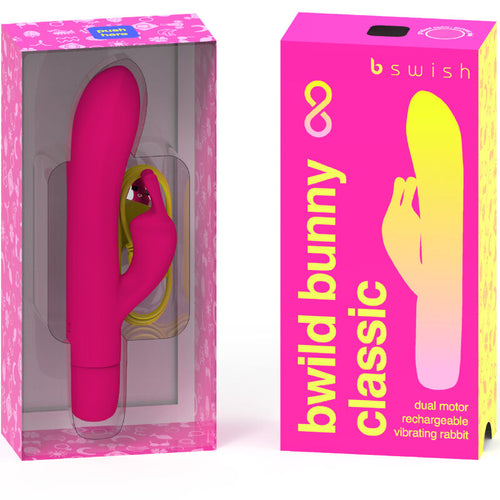 Boîte Bwild Bunny Classic rose ouverte présentant le rabbit fuchsia, à côté la boîte fermée jaune et rose. Packaging dual motor rechargeable vibrating rabbit, vitrine produit.