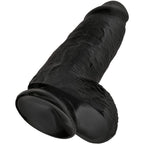 Gode realiste noir King Cock Chubby vu de la base, testicules moules et large ventouse, angle rapproche montrant l'assise du gode sur fond blanc.