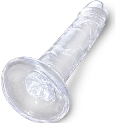 Gode King Cock Clear translucide couché de trois quarts, gland bulbeux et fût lisse veiné, large ventouse plate qui assure le maintien.