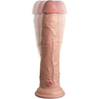 Gode realiste King Cock Elite en silicone teinte claire de face, gland prononce et fut veine sur base ventouse, bouton de vibration visible, modele bi-densite a telecommande, effet peau.