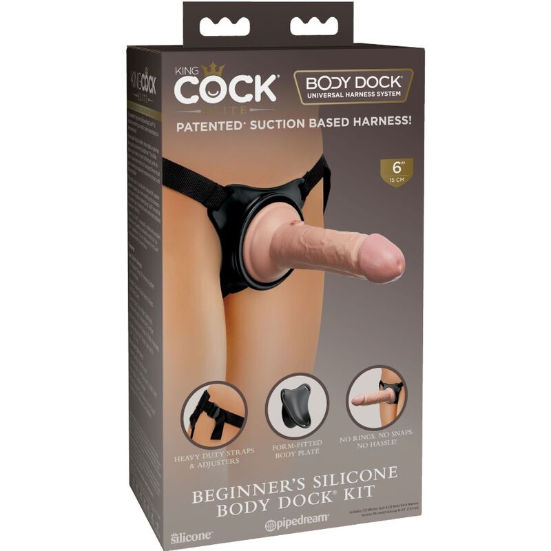 Boite Beginner's Silicone Body Dock Kit, harnais strap-on a succion avec gode realiste visible sur l'emballage King Cock brun.