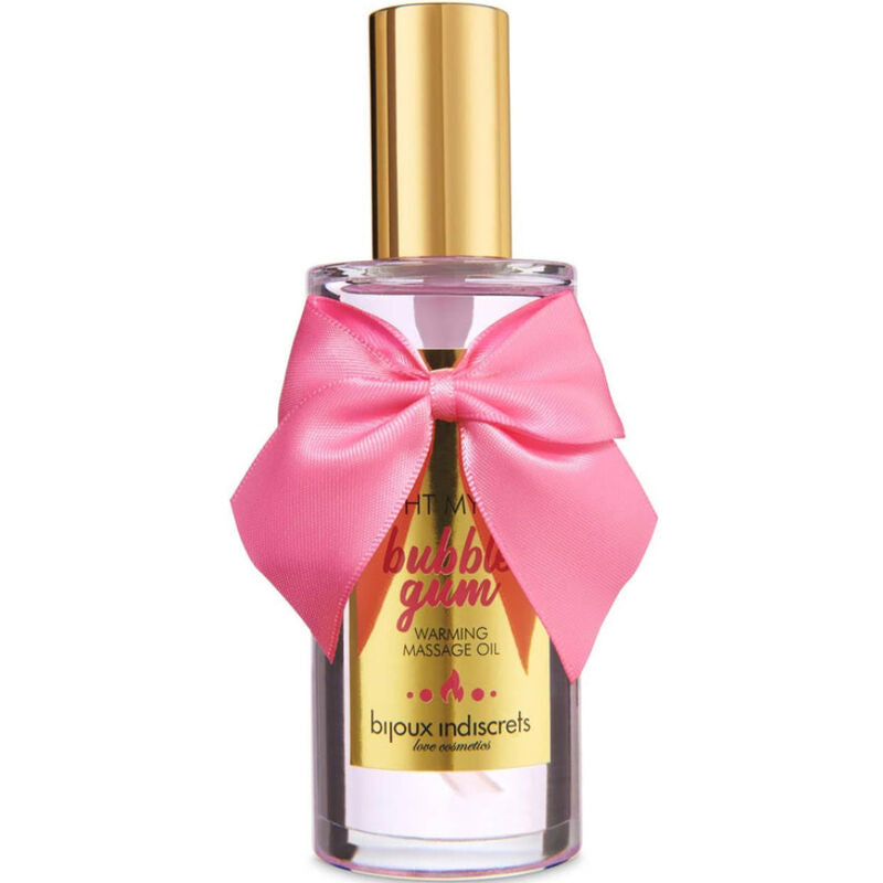 Flacon huile de massage Bubblegum Bijoux Indiscrets a bouchon dore et gros noeud satin rose, photographie isolee sur fond blanc, cosmetique gourmand fraise