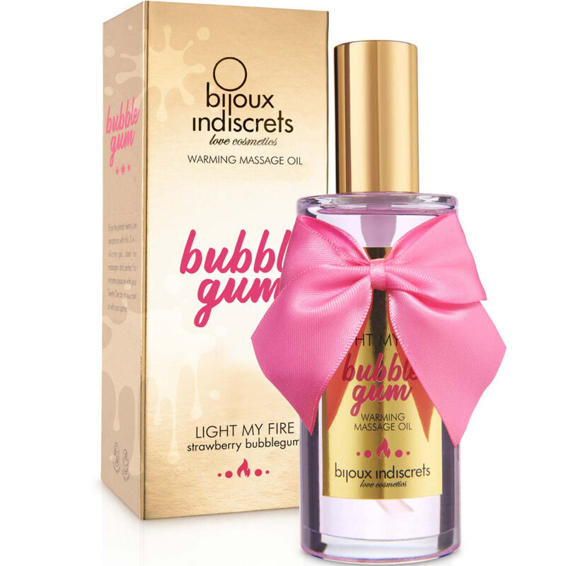 Huile de massage chauffante Light My Fire Bubble Gum Bijoux Indiscrets, flacon dore a noeud rose et boite assortie, cosmetique gourmand fraise sur fond blanc
