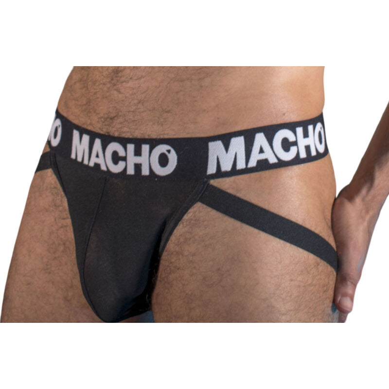 Jockstrap homme noir semi-transparent MX25NN vu de trois quarts, maille transparente pochette anatomique lanieres logo Macho cuisse nue, maintien et seduction masculine
