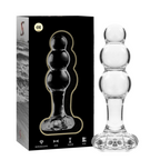 Boite noire Nebula Series du plug anal en verre borosilicate perle, packaging et produit transparent presentes cote a cote, longueur 10,5 cm, jeu de temperature.