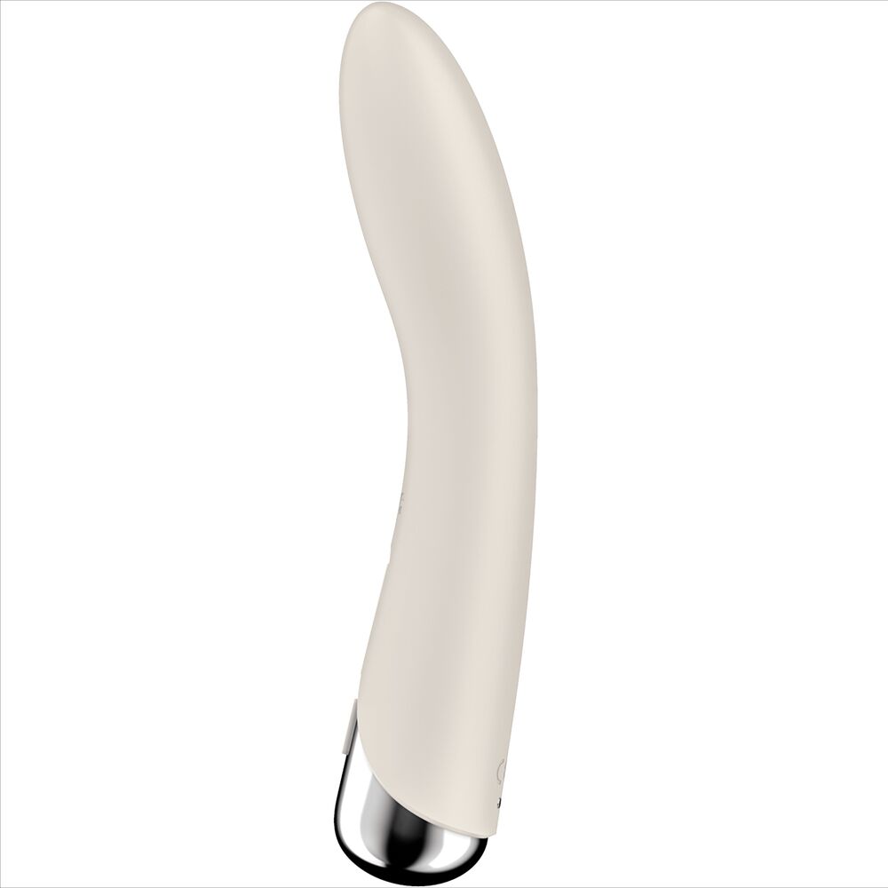 Spinning Vibe 1 ivoire vu de profil, tige courbee en silicone et base metallique, vibromasseur point G a tete rotative 5 vitesses, etanche et rechargeable