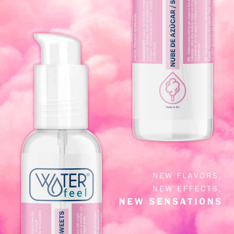 Gros plan du flacon Waterfeel nube de azucar sweets sur fond rose nuageux, lubrifiant gourmand base eau, nouvelles sensations sucrees pour moments intimes