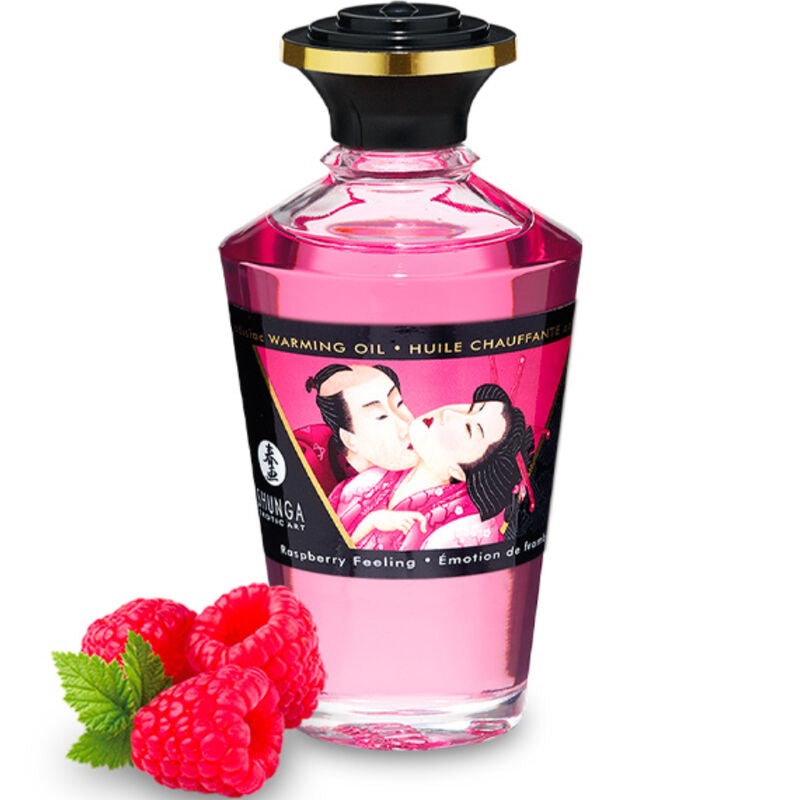 Flacon rose huile chauffante Shunga Raspberry Feeling avec framboises, etiquette illustree d un couple enlace, huile gourmande effet chaleur saveur framboise du kit baisers fruites