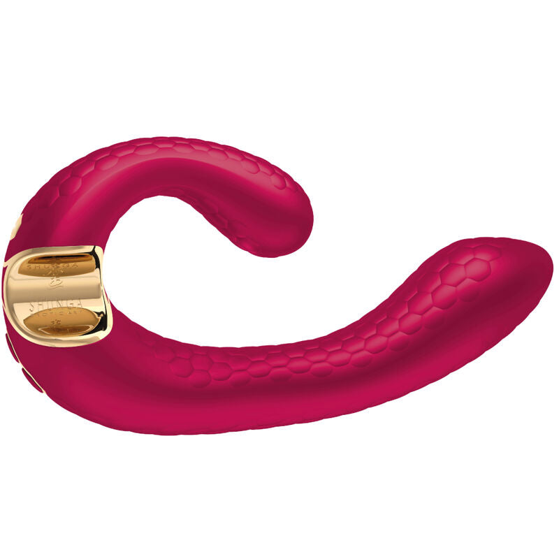 Stimulateur Miyo Shunga fuchsia vu de profil, double bras incurve en silicone texture et embase doree, vibromasseur couple flexible, etanche et rechargeable par USB.