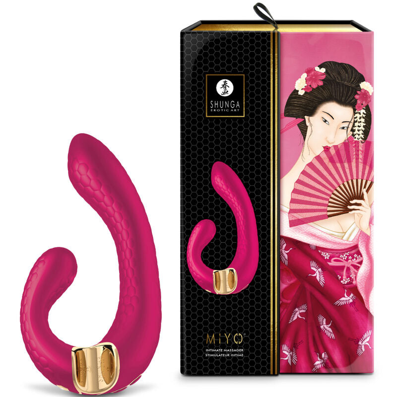 Stimulateur Miyo Shunga fuchsia a cote de sa boite ornee d'une geisha en kimono, vibromasseur couple en silicone a deux bras flexibles, etanche et rechargeable USB.