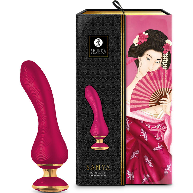 Vibromasseur Shunga fuchsia courbe a base doree pose a cote de sa boite noire ornee d'une illustration de geisha en kimono, stimulateur silicone Sanya etanche rechargeable.