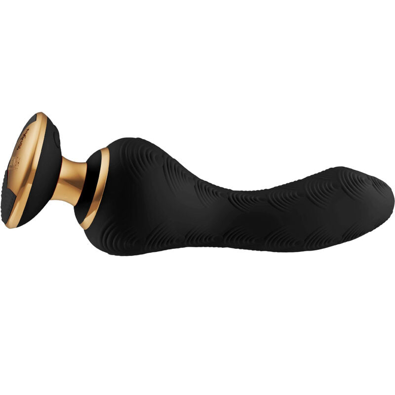 Vibromasseur Sanya Shunga noir présenté à plat, corps galbé ondulé et large embase ventouse dorée, silicone souple insertable conçu pour le plaisir vaginal et le point G.