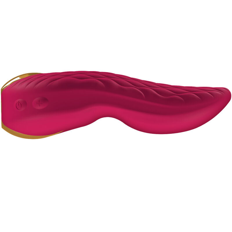 Stimulateur Aiko Shunga fuchsia vu de profil allongé, surface ondulée texturée et liseré doré, silicone soyeux étanche rechargeable pour stimulation clitoridienne douce.