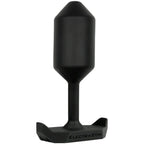 Plug anal WMCEBP ElectraStim en silicone noir presente de profil, tete bulbeuse et large base anti-perte signee ElectraStim, electrode e-stim a noyau lourd.