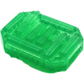 Dé masturbateur Tenga Uni Émeraude en silicone souple vert translucide, vue de trois quarts montrant la texture en relief géométrique de ce stimulateur unisexe discret de 9 cm.