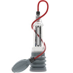 Pompe penienne hydraulique Bathmate Hydroxtreme 7 transparente avec poire de pompage rouge et soufflet gris, vue de profil pour force d'aspiration controlee a l'eau