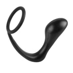 Anneau penien en silicone noir avec plug anal integre, forme courbee lisse et anneau extensible, presente seul sur fond blanc.