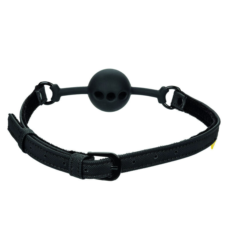 Baillon boule Boundless vu du dessus, boule silicone noire ajouree et sangle a boucle, anneaux pivotants, accessoire de soumission reglable pour couple.