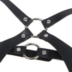 Harnais intégral à boucles en cuir noir — détail texture surface