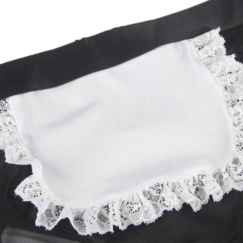 Detail du tablier blanc a volant de dentelle du costume servante Subblime, contraste noir et blanc et bordure froncee soignee, accessoire de jeu de role coquin inclus dans le set.