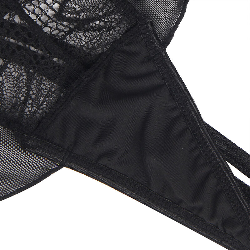 Gros plan sur l'entrejambe en tulle et la dentelle du teddy noir Subblime présenté à plat, détail de la coupe ouverte de la lingerie sensuelle