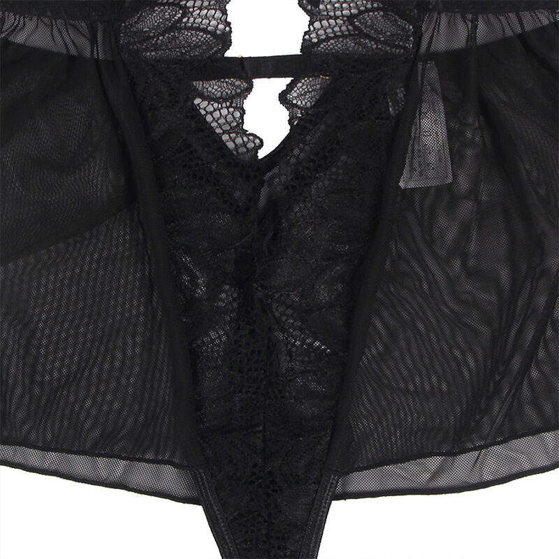 Gros plan macro sur la dentelle florale et la jupe en tulle transparent du teddy noir Subblime, détail matière de la lingerie sensuelle féminine