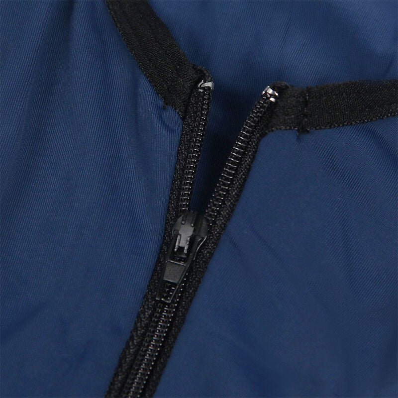 Zoom sur la fermeture zippée à double curseur du body policière bleu marine Subblime, illustrant le détail fonctionnel central et la bordure tressée contrastante de la tenue de rôle.