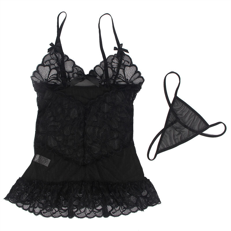 Nuisette babydoll noire Subblime en dentelle florale posée à plat avec string assorti, bonnets à noeuds et jupe festonnée, ensemble présenté sur fond clair.