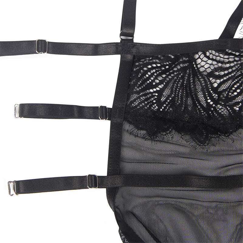 Gros plan sur les bretelles reglables a glissieres et la dentelle ajouree de la nuisette noire Subblime, insert mesh transparent, detail produit a plat.