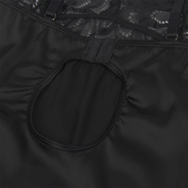 Gros plan de la zone centrale satinee du babydoll noir Subblime, fronce et decoupe arrondie sous le buste, finition satin lisse et brillante, presentation produit sans modele.