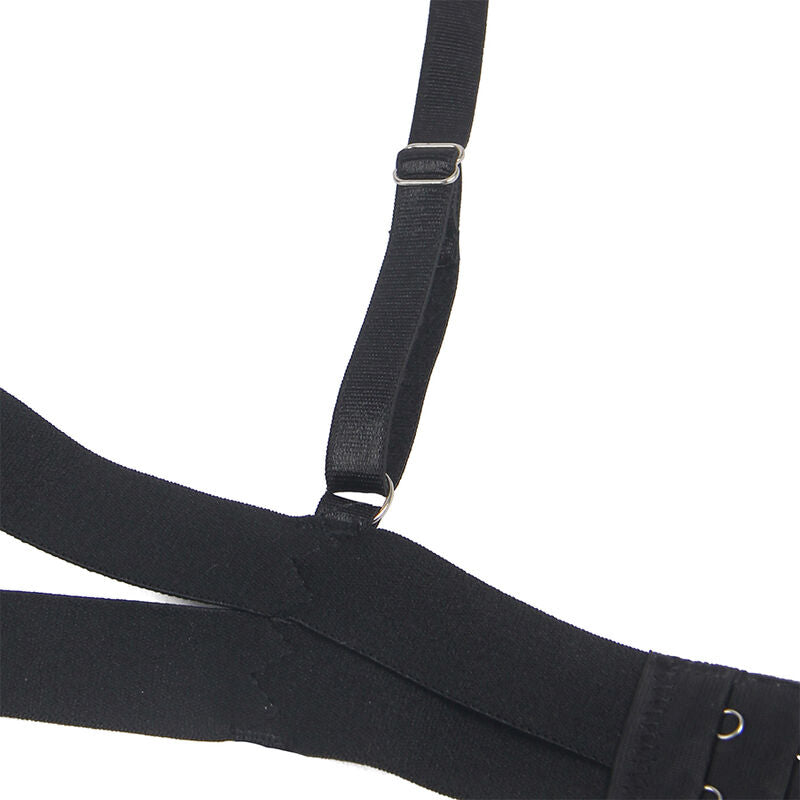 Gros plan d une bande elastique noire du body strappy Subblime avec boucle metal de reglage, texture mate du ruban extensible et detail de l attache reglable, sans modele.