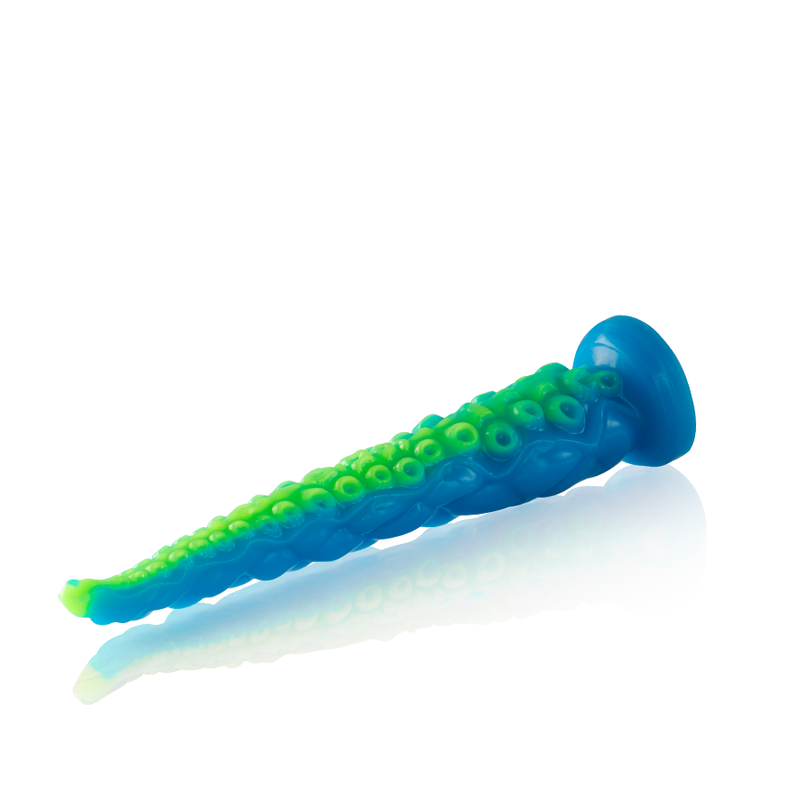 Gode tentacule fin fluorescent bleu et vert presente couche, base ventouse visible et longue tige effilee, texture de ventouses fantasy pour exploration en douceur