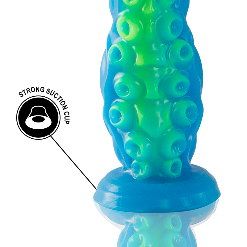 Gros plan sur la base ventouse et le relief de ventouses du gode tentacule fluorescent bleu et vert, pictogramme ventouse puissante soulignant la stabilite du modele