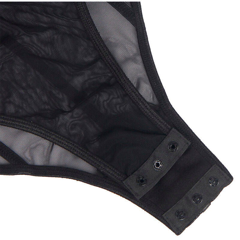 Gros plan sur l entrejambe du body noir Subblime, fermeture par pressions a trois crochets et bordure en voile transparent de la maille fine.
