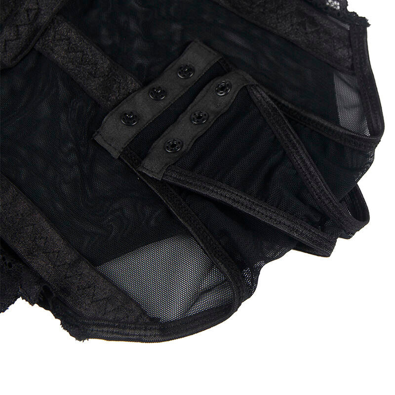 Gros plan sur l entrejambe a pressions du teddy noir Subblime, trois crochets de fermeture sur la maille voile, bordure de dentelle et finition souple.