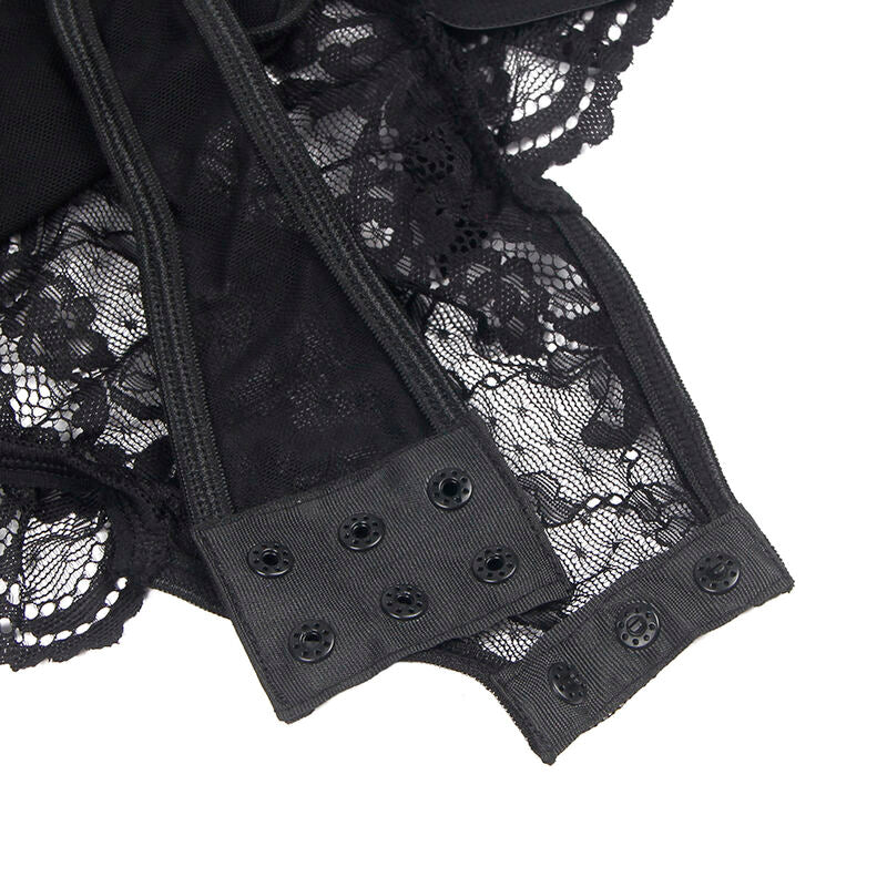 Gros plan sur les rangees d agrafes et la dentelle florale du teddy noir Subblime, bande satin et maille ajouree, detail technique presente a plat.