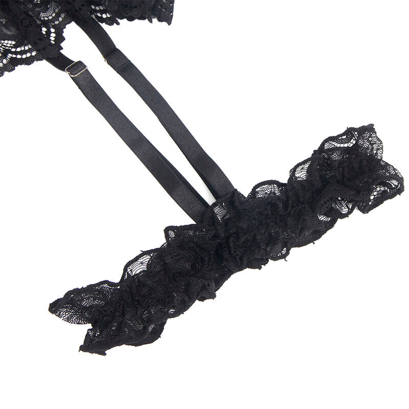 Detail de la jarretiere a volant en dentelle noire du teddy Subblime, froufrou dentele et sangle reglable, finition decorative montree sans modele.
