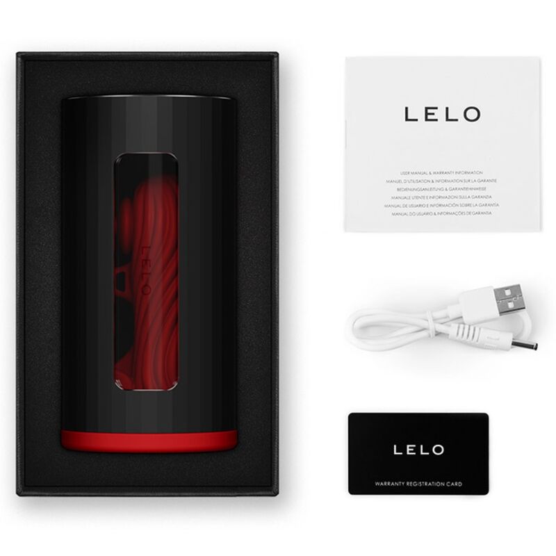Coffret Lelo F1S V3 ouvert avec console rouge, notice, cable USB et carte garantie, masturbateur masculin connecte sans element anatomique.