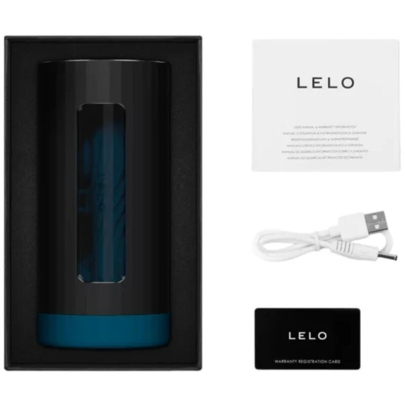 Coffret Lelo F1S V3 ouvert avec console bleue, notice, cable USB et carte garantie, masturbateur masculin connecte sans visuel anatomique.