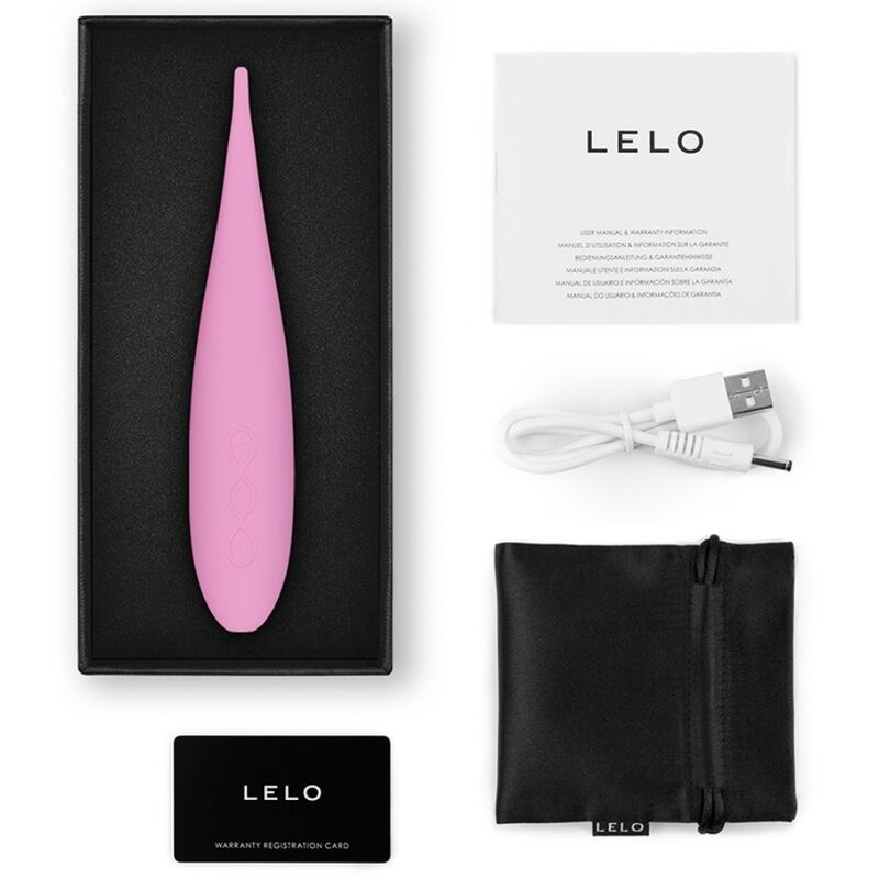 Vibromasseur Dot Travel rose dans son coffret avec câble USB, pochette satin et carte Lelo, embout pointu souple en silicone pour cibler précisément le clitoris.