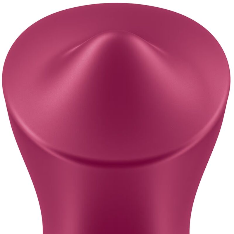 Gros plan sur la pointe en silicone du stimulateur Satisfyer Exciterrr framboise, surface bombee abritant la bille rotative de stimulation a poser.