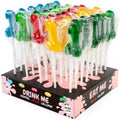 Presentoir Drink Me de sucettes coquines colorees moulees en forme de sexe masculin, friandises Eat Me comestibles legerement alcoolisees pour soirees festives.