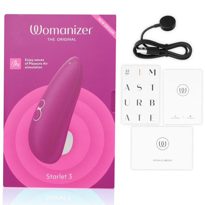 Boîte fuchsia du Starlet 3, câble de charge et cartes de notice à côté, stimulateur clitoridien Womanizer rose foncé par aspiration d'air. Présentation complète du coffret cadeau.