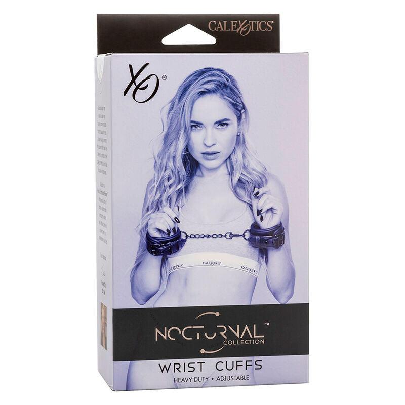 Boite Nocturnal Wrist Cuffs montrant une modele en lingerie poignets lies, packaging des menottes de poignets en cuir a chaine metal CalExotics.