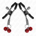 Paire de pinces a tetons a machoires noires et grelots rouges sur fond blanc, serrage a ressort reglable et tintement sonore, accessoire Kink.